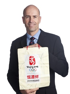 Frank Glatz with an official, biodegradable bag from the 2008 Olympics.